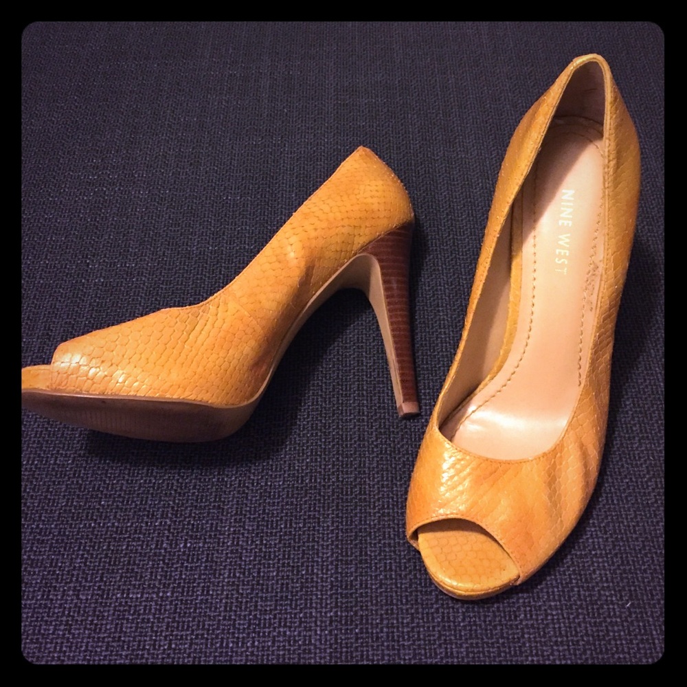 Nine West camel color pumps in size 6.5.