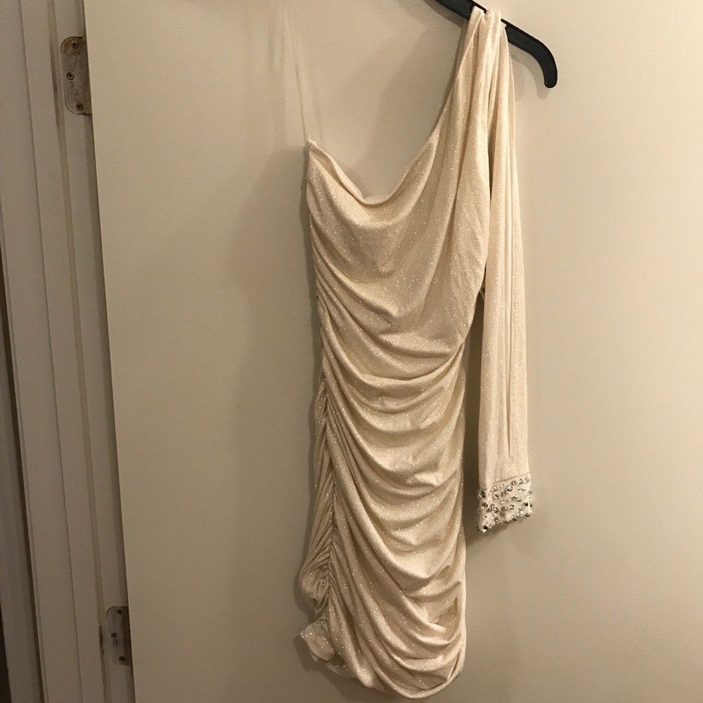 White one shoulder dress with gold glitter