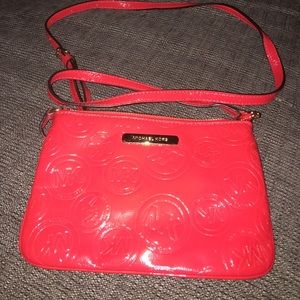Red Michael Kors cross body purse