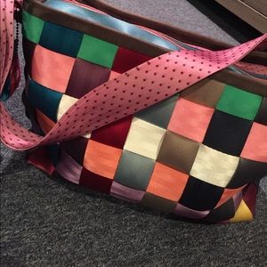 Unique "seatbelt" diaper bag