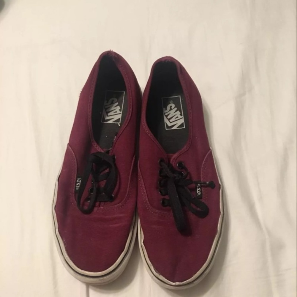 Maroon vans.