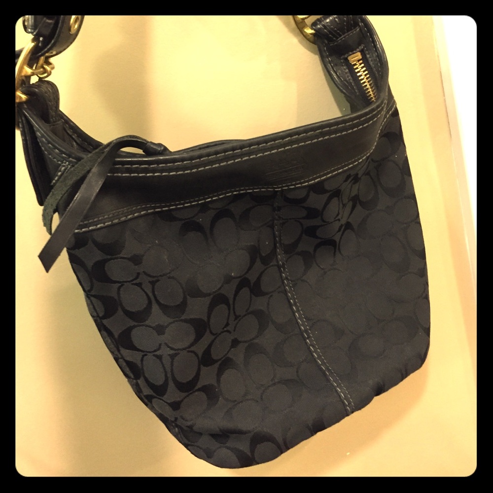Black Coach purse in good condition.