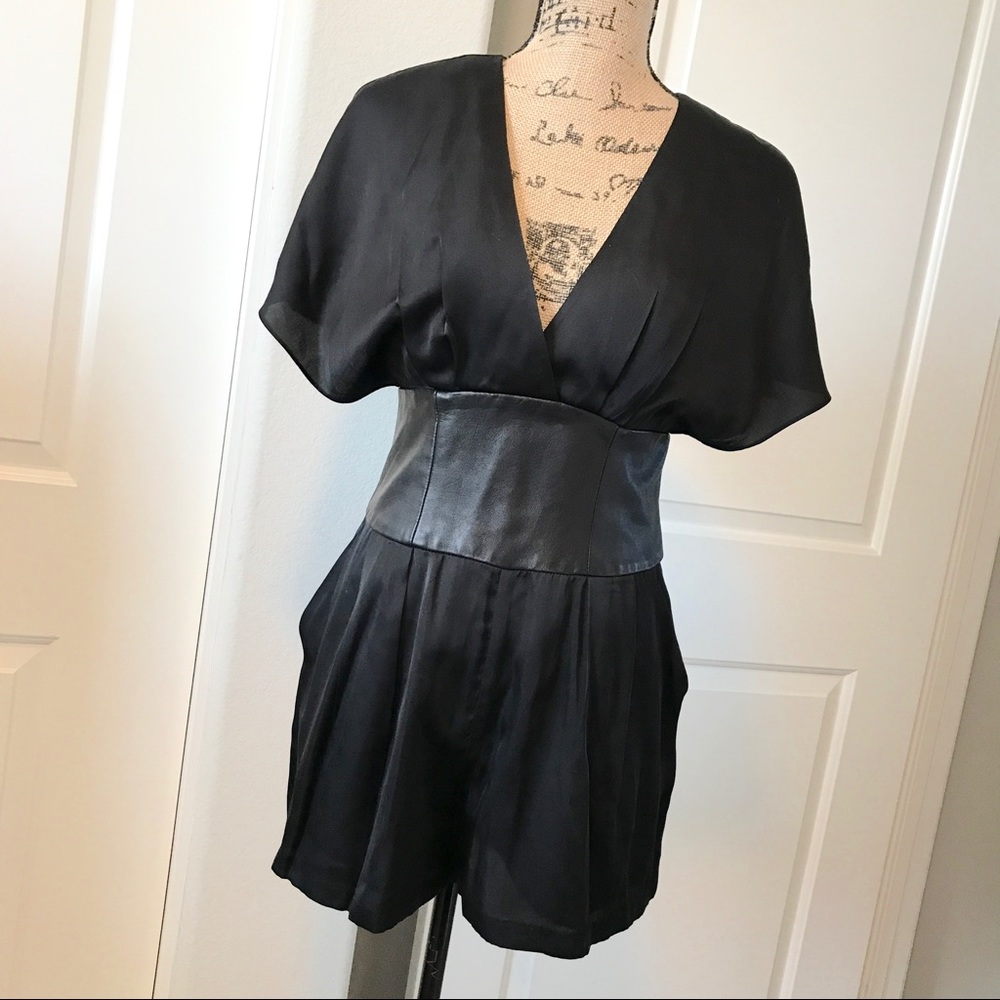 BEBE women's black romper with faux leather band