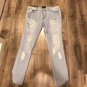 Light blue ripped jeans