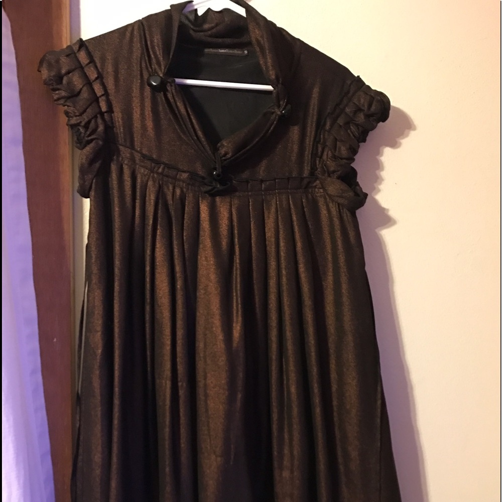 Brown dress w bronze accents.