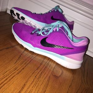 Purple and light blue Nike free run