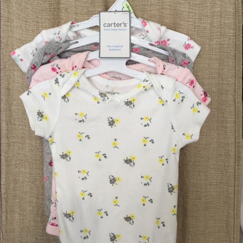 four 3M Carters Original Onsies