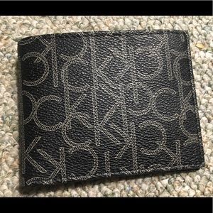 Men's never been used Calvin Klein black wallet