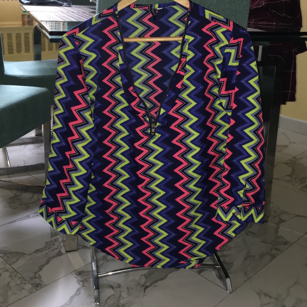 Blue green pink and white shirt