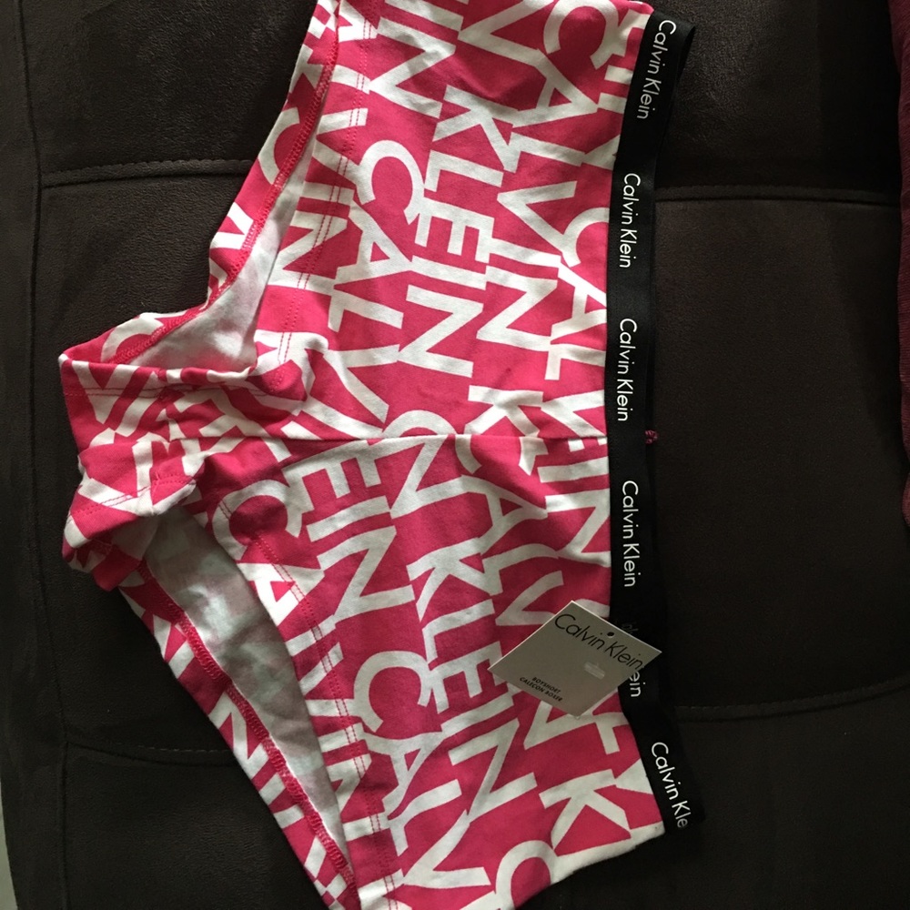 PINK AND WHITE CALVIN KLEIN BOY SHORTS