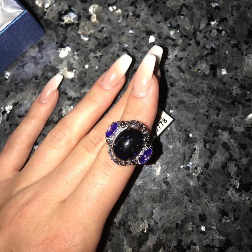 Purple sparkly stone ring
