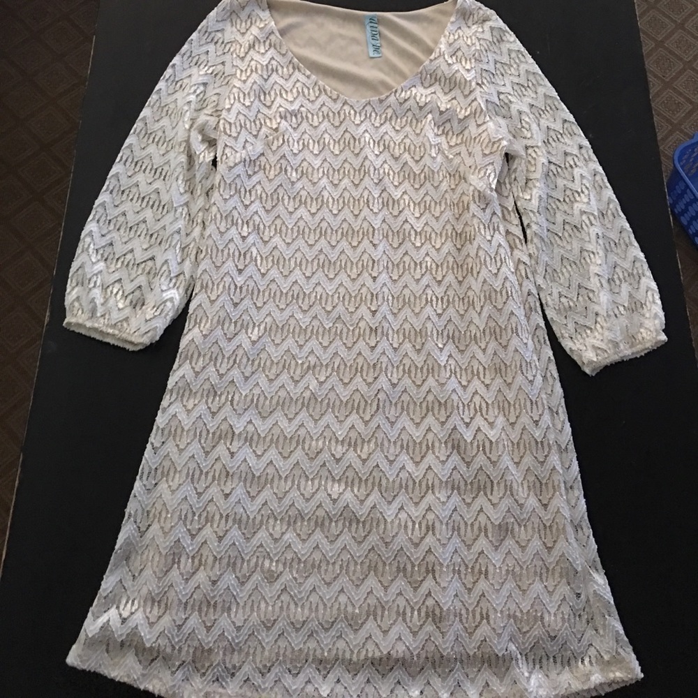 Cream and gold colored dress