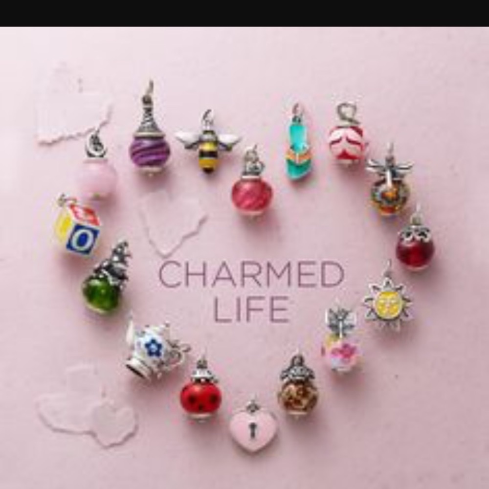 ISO.. James Avery purple glass swirl bead