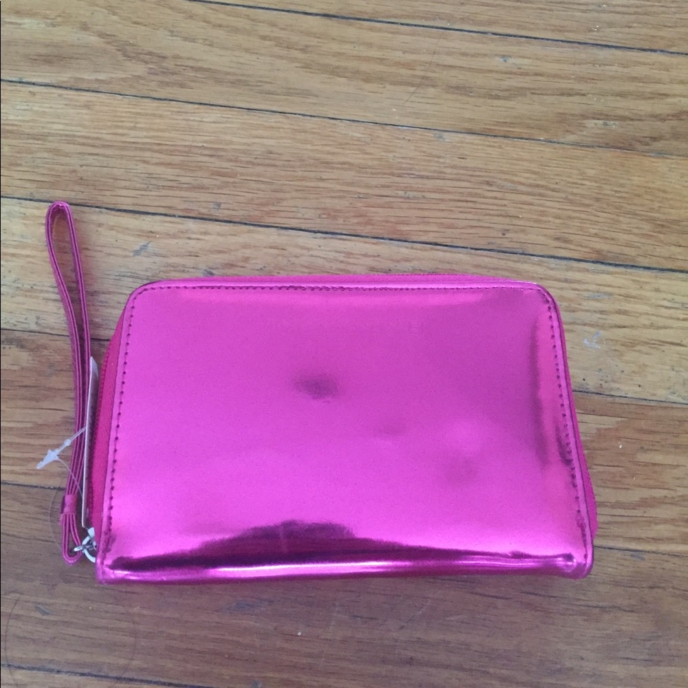 Pink Victoria's Secret wristlet bag.