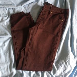 Mid- rise burgundy skinny jeans