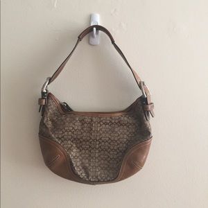 Coach small purse. Brown with interlocking "c" des