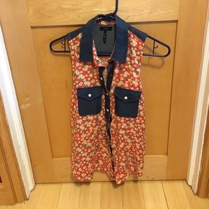 Floral button-up blouse.