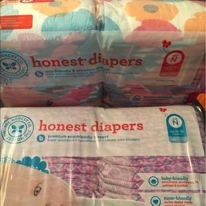 Two packs honest company newborn diapers