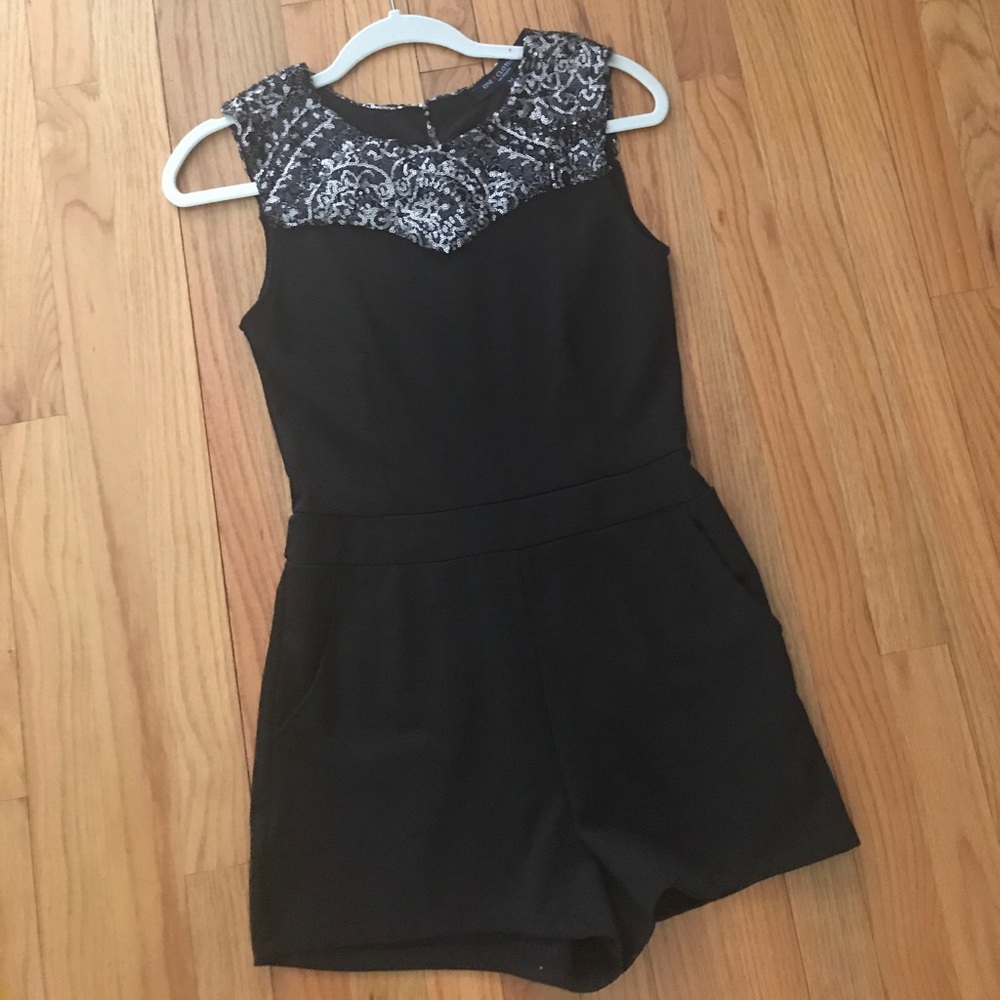 Black patterned romper.