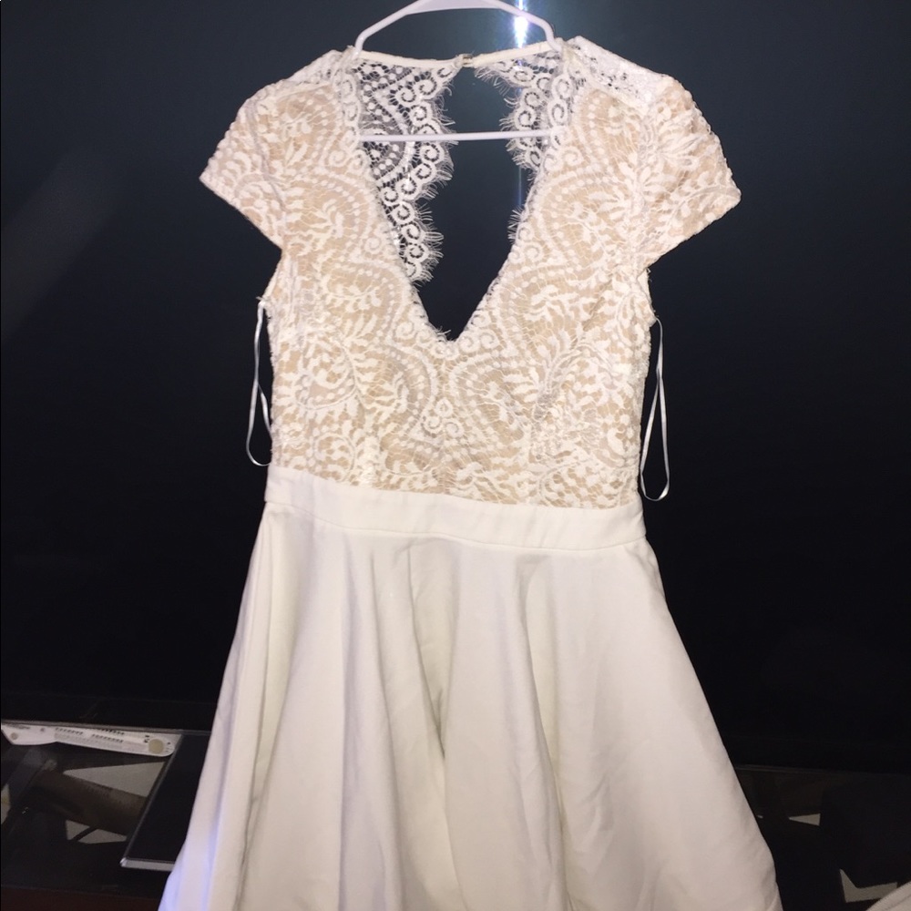 A  cream off white dress