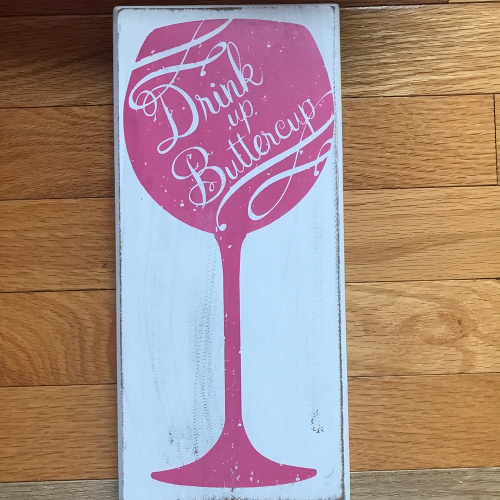 Wooden drink up buttercup sign