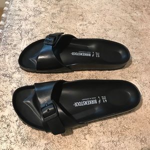 Black Birkenstock flippers