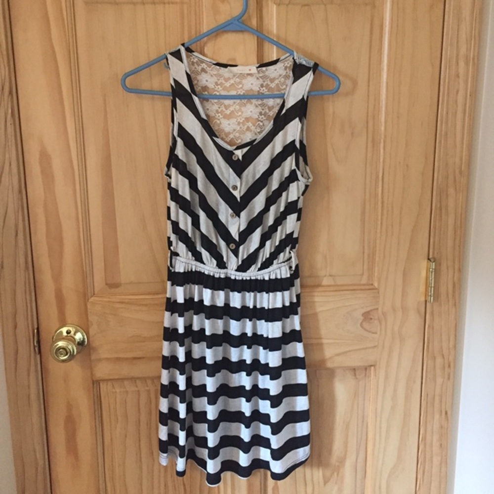 Striped mini dress with a laced back