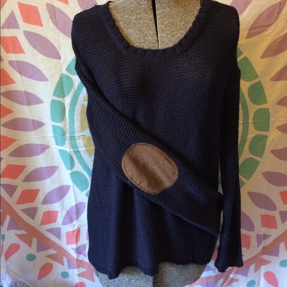 Loose knot cable sweater with elbow patches