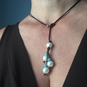 Hand beaded Leather and pearl necklace & earrings.