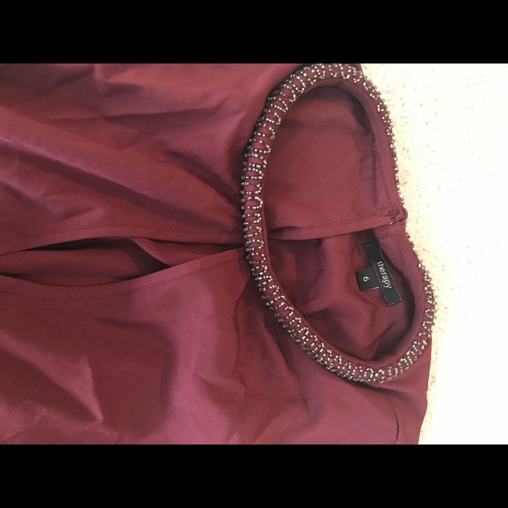 Maroon cross-back top with sequins