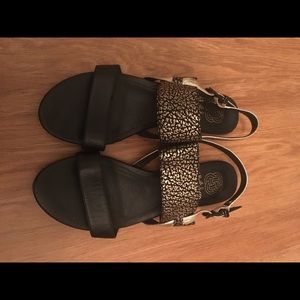 Elliott Lucca black and gold leather flat sandals