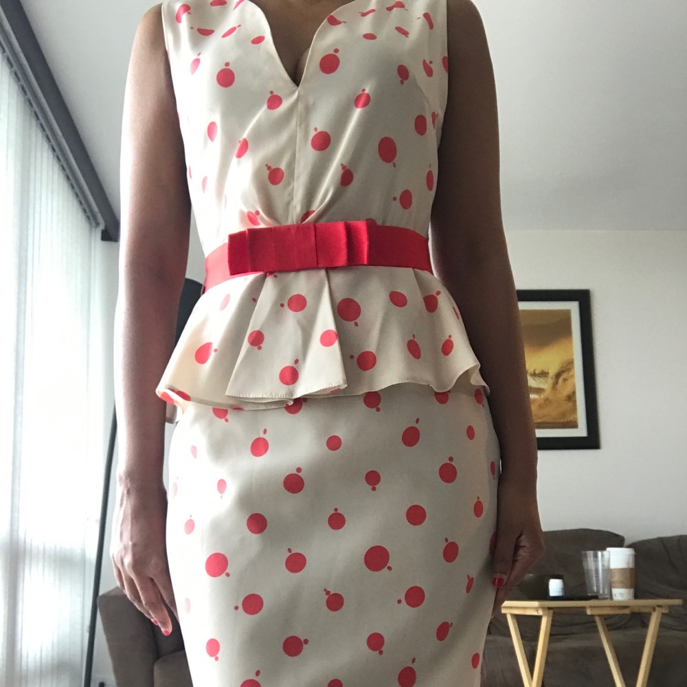 Ivory and pink polka dot peplum dress