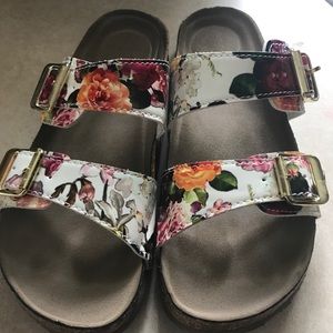 Birkenstock inspired sandals .