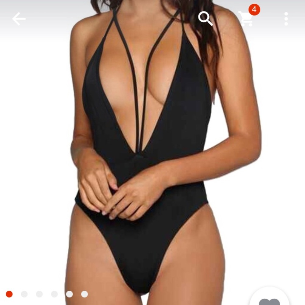 Brand new black strappy one piece swimsuit