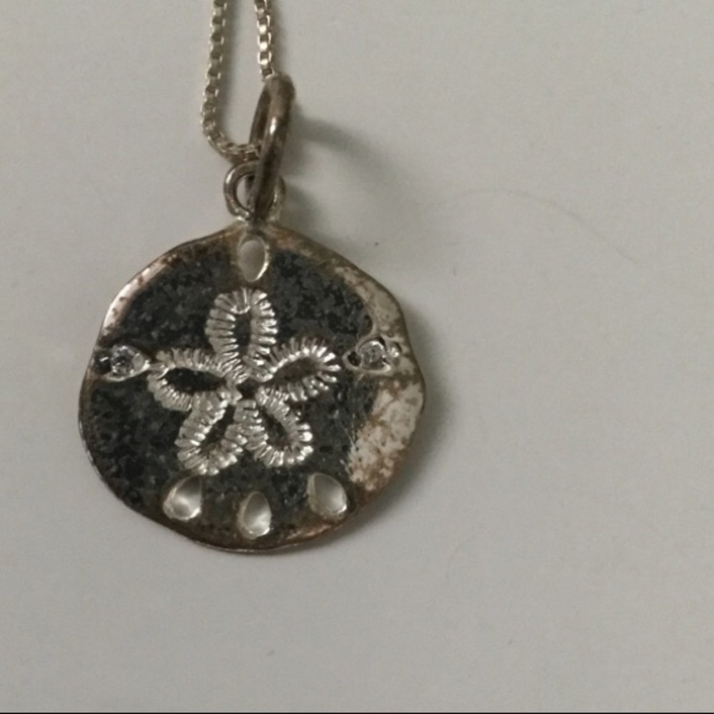 Silver sand dollar necklace