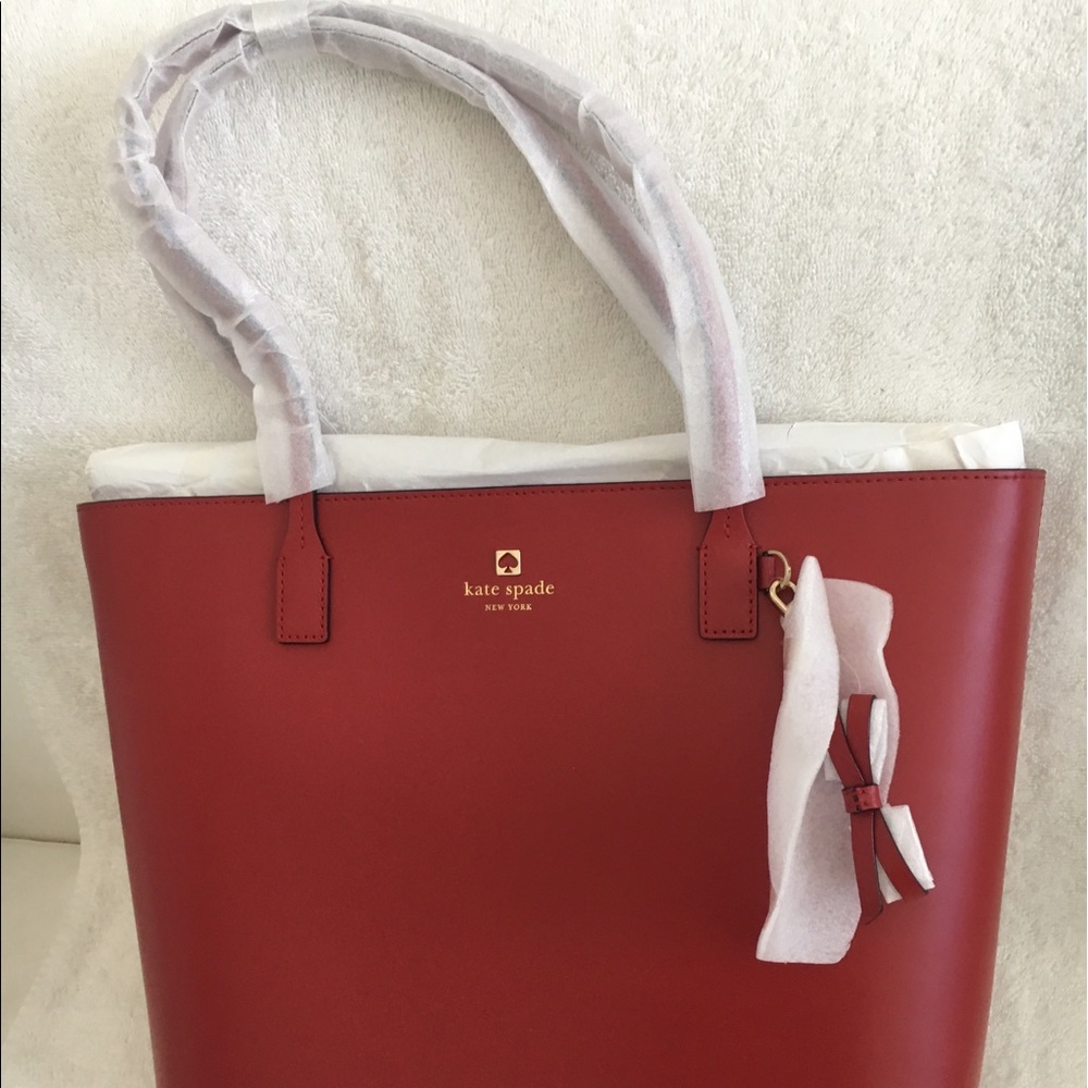 Kate Spade.  Sawyer Street Tori.  Brand new.  Red