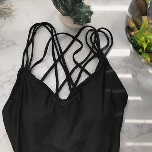 • Black one-piece swimming attire •