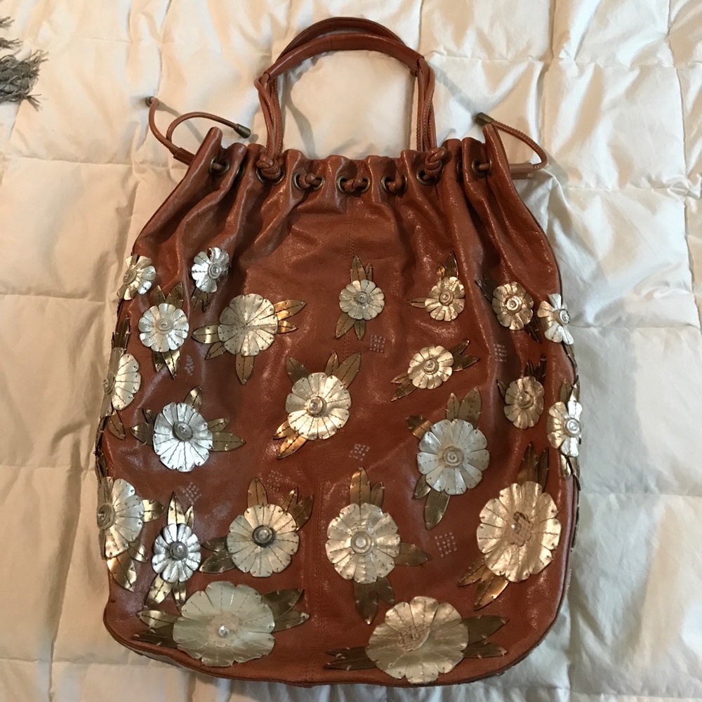 Large Cole Haan cognac tote with leather flowers