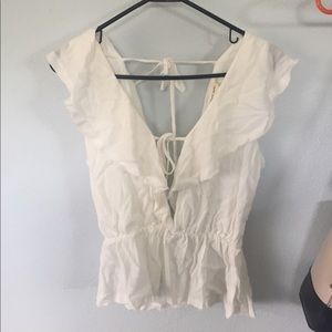 White ruffled top