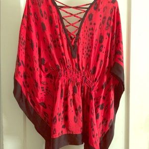 Red silk shirt. Worn only once.