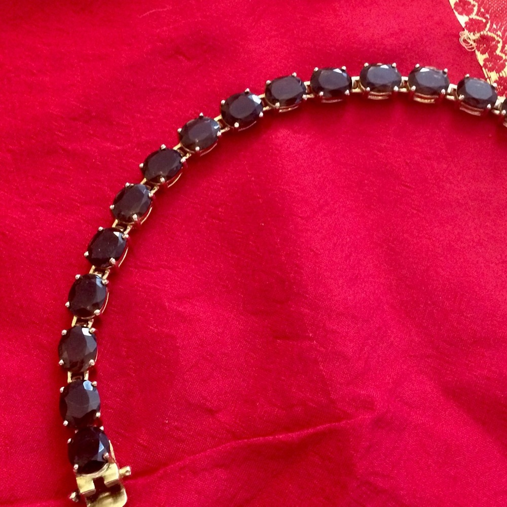 Brown stone and gold toned metal bracelet