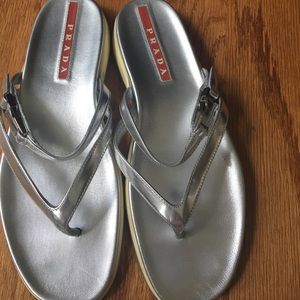 Silver Prada flip flops