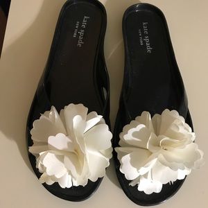 Kate Spade jelly black flip flop w/ white flower