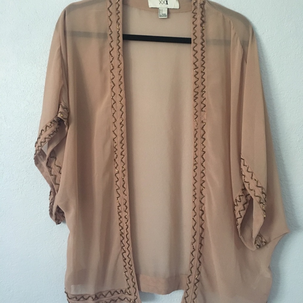 Sheer pink cover with beaded ends