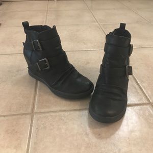 Black faux leather wedges