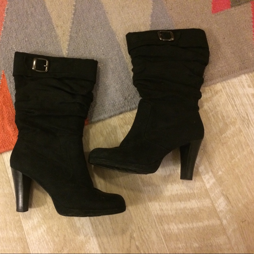 Tall black suede boots