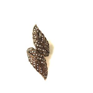 Diamond studded leaf ring.