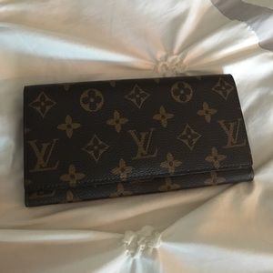 Louis Vuitton leather brown wallet