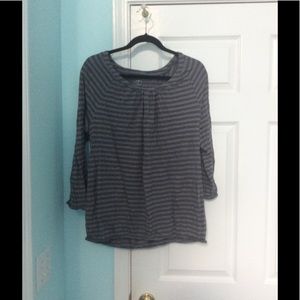 Black and grey striped shirt.