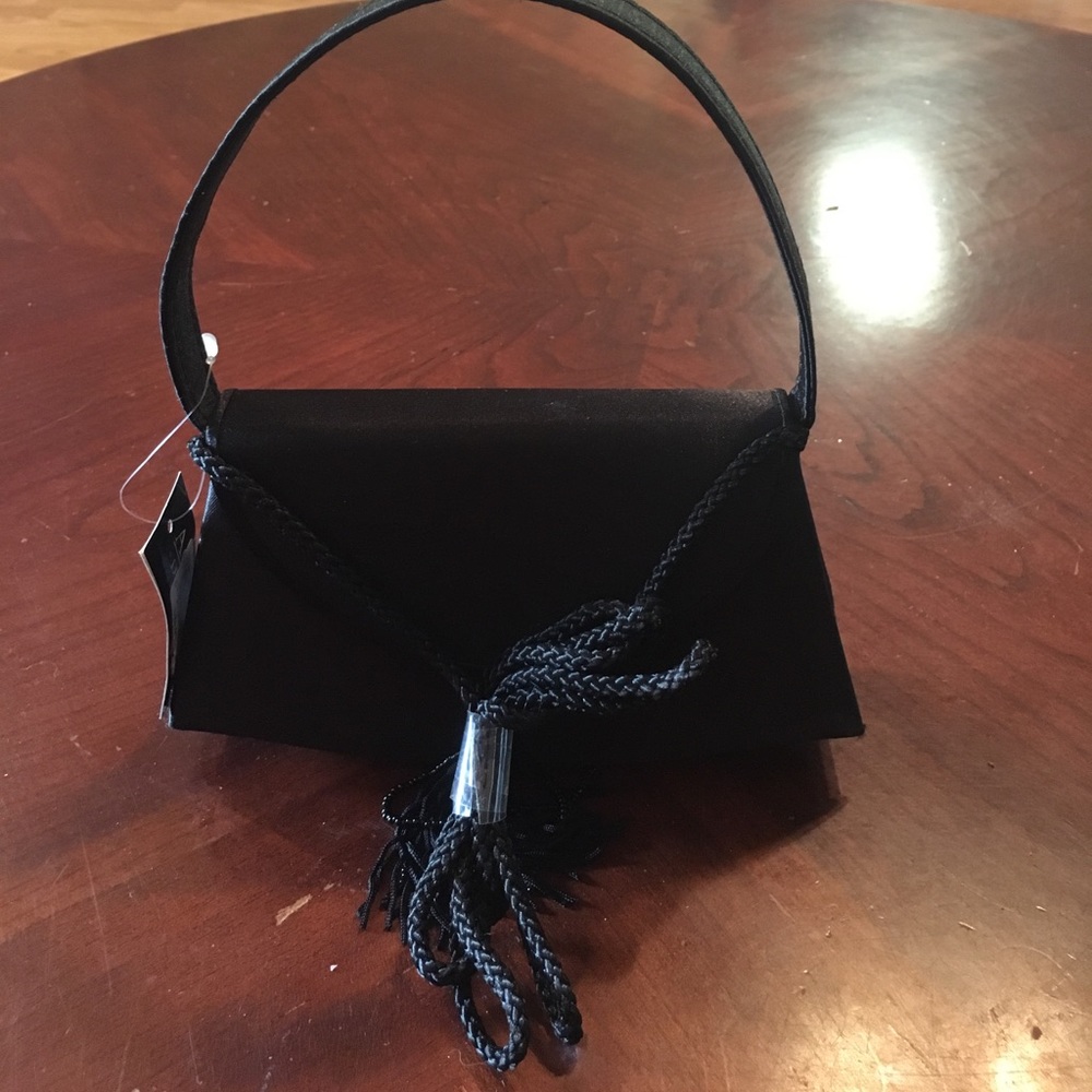 Black cocktail bag with tassels
